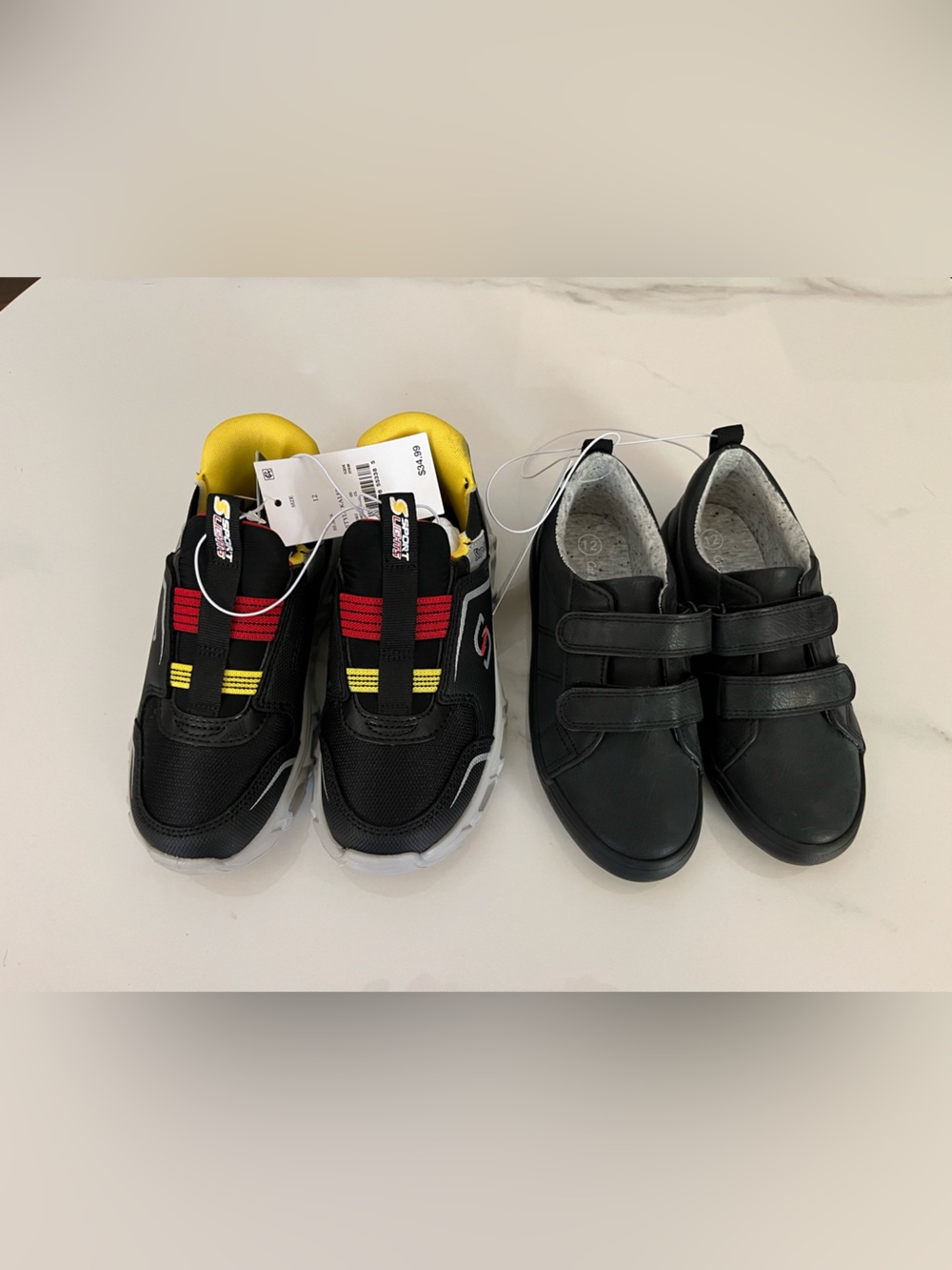 Skechers Kids Black Sneakers with Red and Yellow Accents and black Velcro shoes